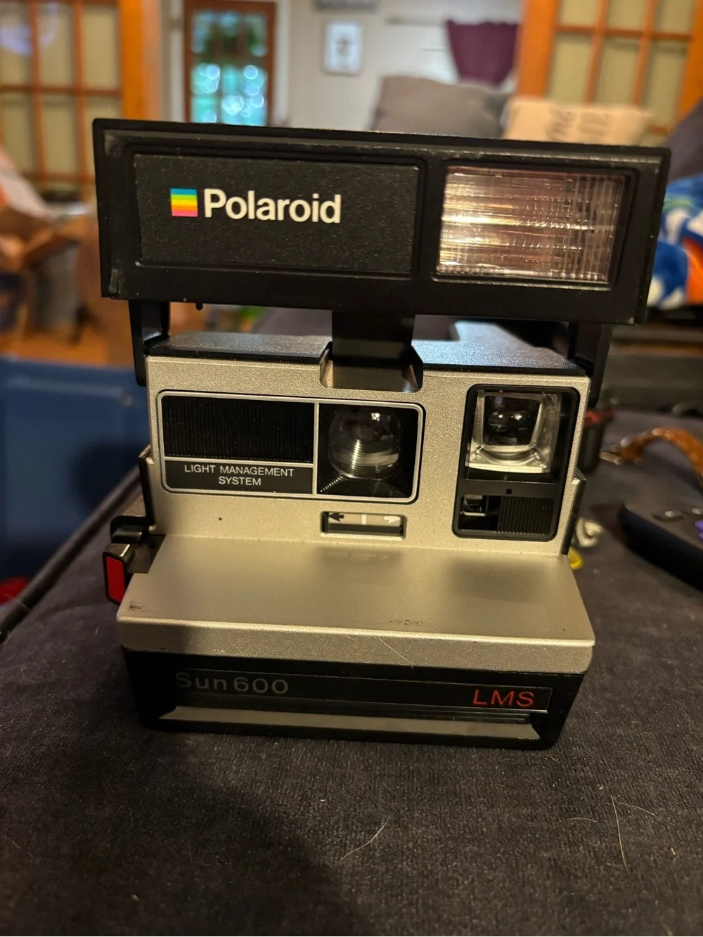 Polaroid Sun 600 LMS Instant Camera - Black and Silver